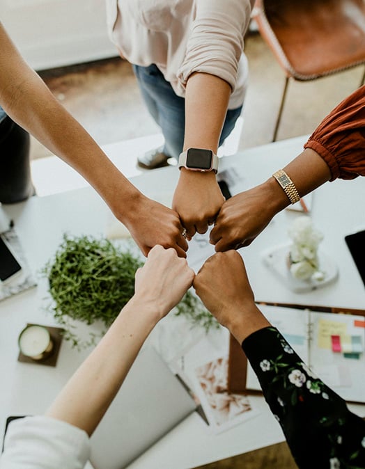 About_team fistbump-rawpixel-1220994